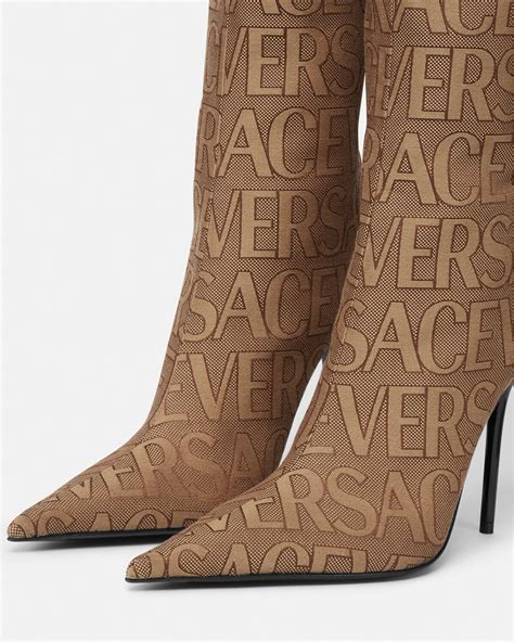 versace brown ankle boots|Versace thigh high boots.